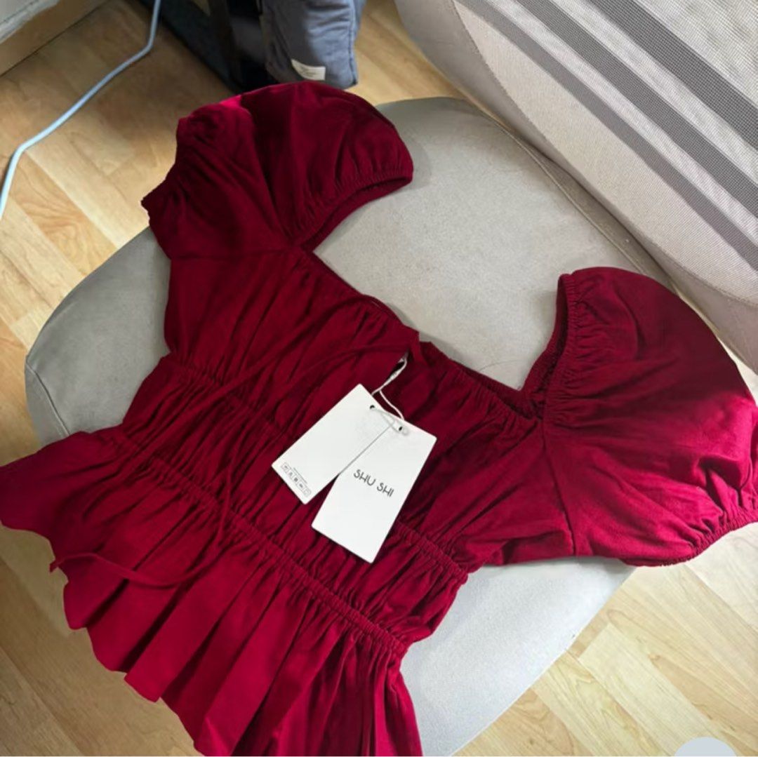 Shushi Linen Top Red (Category: Blouses) located in Quezon City. Submitted by patbrandeditems (Listing ID 1414113471, Image 3). Description: - Super good quality linen fabric - fits s-m - Stylish puff sleeves - Fitted bodice with shirring details - Includes a tie at the bust - Deep Red Color .