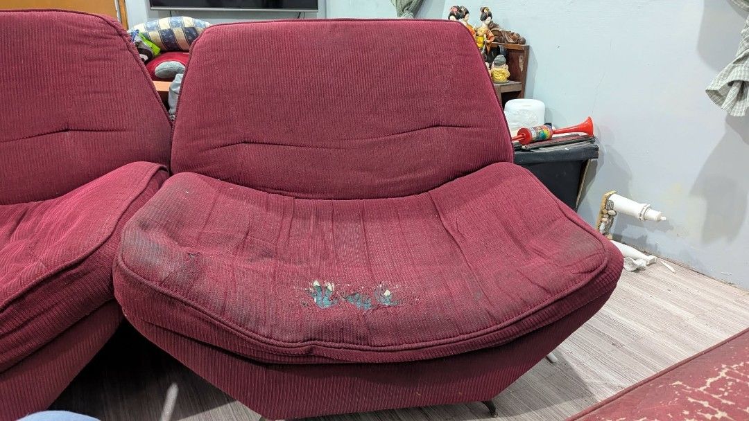 Sofa Set ( 1 four-seater and 2 one-seater) (Category: Sofas) located in Manila. Submitted by eileephants (Listing ID 1413378469, Image 3). Description: Sofa set is maroon, the 4 seater is faux leather and the other 1 seaters have corduroy-ish cloth. Set comes with sofa covers (gray). With minor upholstery concerns but still very usable!.