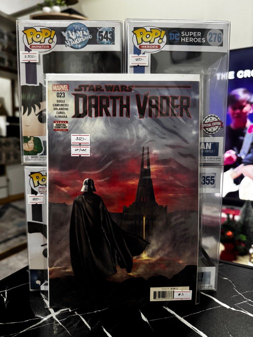 Star Wars Darth Vader #23 Comic Book (Category: Comics & Manga) located in Pateros City. Submitted by lacasadekartonph (Listing ID 1414129124, Image 1). Description: - Darth Vader #23 comic book - Featuring Soule, Camuncoli, Orlandini, Curiel, and Almara - Includes a special edition sticker - Price: ₱350 - Comes in a protective case.