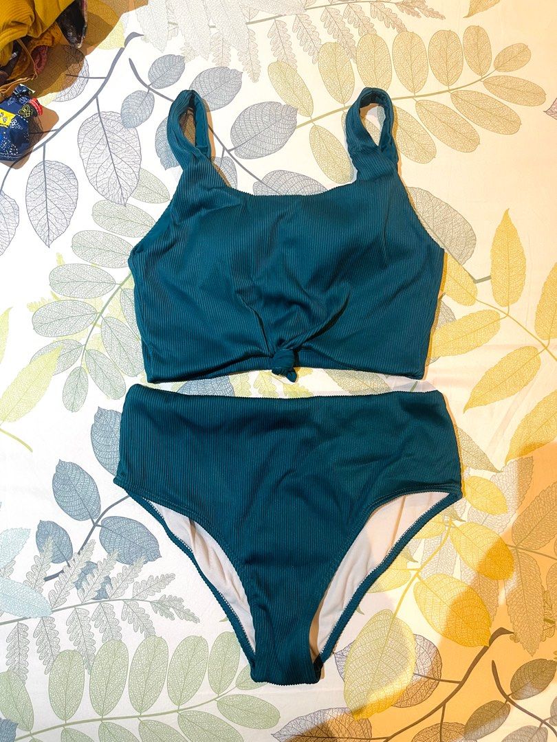 Teal Ribbed Bikini Set (Category: Bikinis & Swimsuits) located in Cainta. Submitted by coatclosetph (Listing ID 1414176178, Image 1). Description: - Teal ribbed bikini set - Knotted front top - High-waisted bottoms - Textured, ribbed fabric - Solid teal color - Bottoms have a lighter lining -small to semi med.