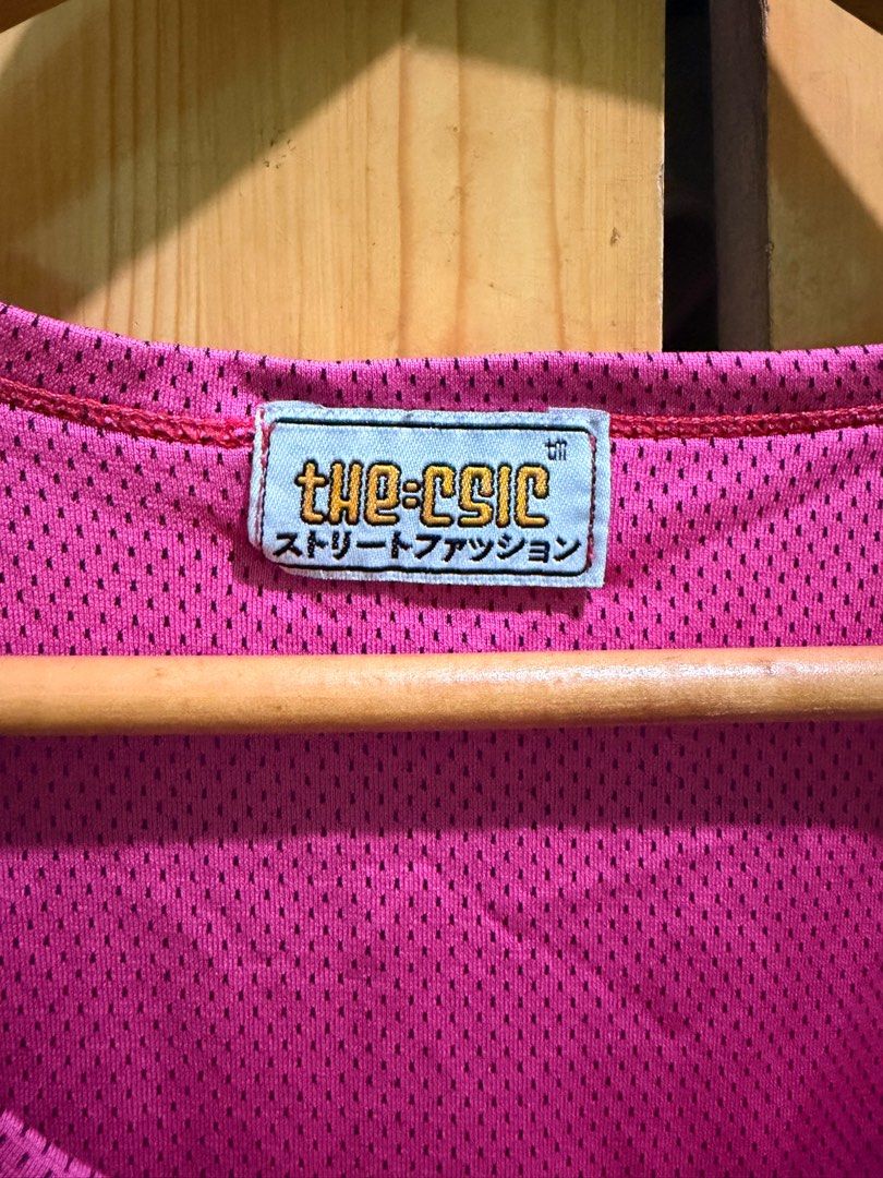 The Chic Chicago Bulls 23 Jersey (Category: Activewear) located in Manila. Submitted by ciiii1 (Listing ID 1414216209, Image 3). Description: - Reversible Chicago Bulls jersey - Features the iconic Bulls logo and #23 - Pink mesh inner layer - Maroon outer layer - Sleeveless design - Made of breathable material.