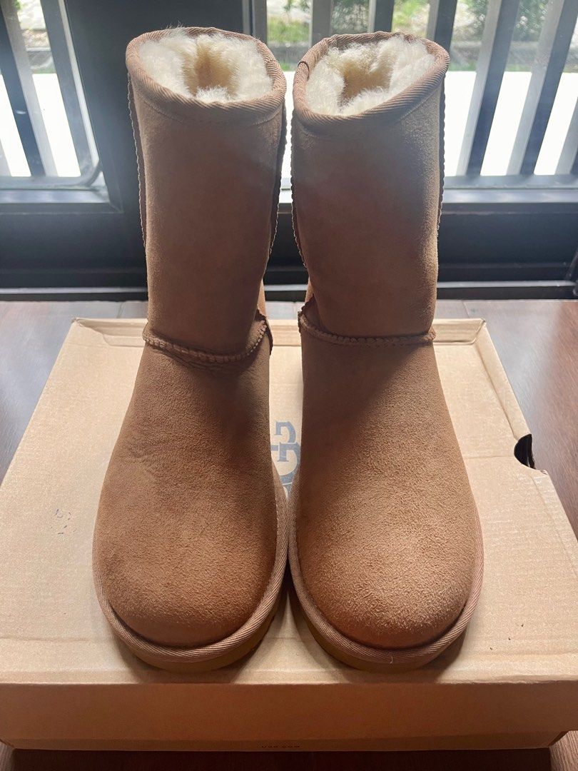 UGG W Classic Short II Boots - Size 8 (Category: Boots) located in Baguio. Submitted by caitlingm (Listing ID 1414055416, Image 2). Description: - Authentic UGG W Classic Short II boots - Size: US 8 (EU 39, 25cm) - Color: Tan - Features a soft, fluffy interior - Comes with original box - Perfect for Womens size 7. -Will give free waterproof spray.