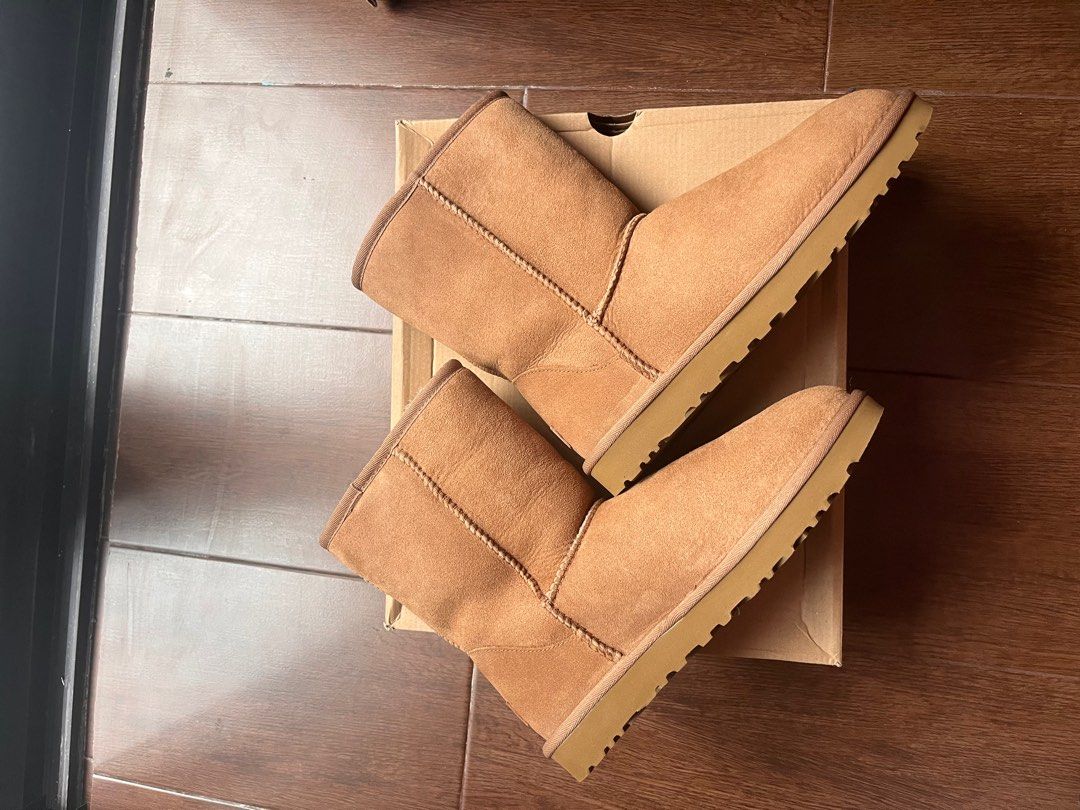 UGG W Classic Short II Boots - Size 8 (Category: Boots) located in Baguio. Submitted by caitlingm (Listing ID 1414055416, Image 1). Description: - Authentic UGG W Classic Short II boots - Size: US 8 (EU 39, 25cm) - Color: Tan - Features a soft, fluffy interior - Comes with original box - Perfect for Womens size 7. -Will give free waterproof spray.