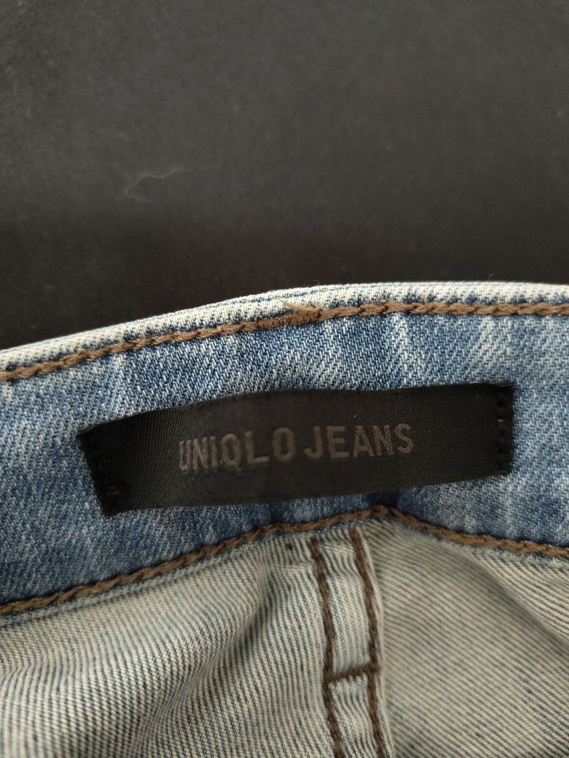 Uniqlo Jeans Distressed Light Wash (Category: Jeans) located in Imus. Submitted by jaeck07 (Listing ID 1414155906, Image 2). Description: - Uniqlo jeans - Light wash with distressed detailing - Classic five-pocket design - Size 31 (79cm) - Made in Bangladesh - Material: 93% cotton, 5% polyester, 2% spandex - Button and zipper closure.