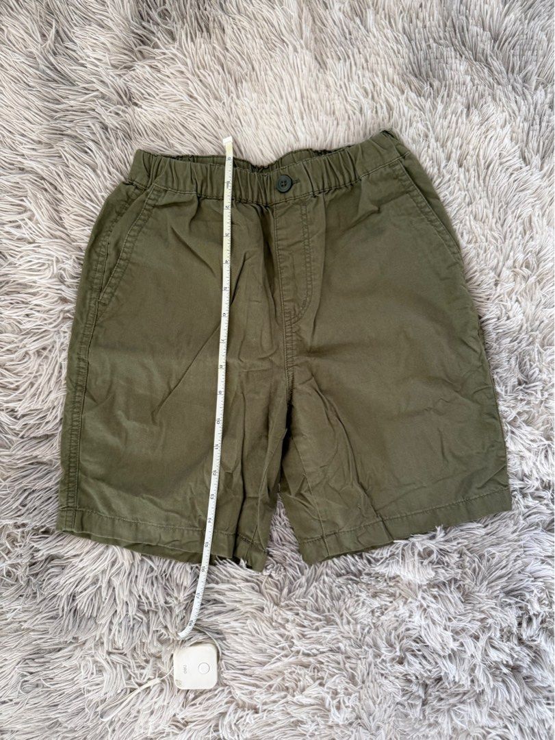 Uniqlo Olive Green Shorts (Category: Babies & Kids Fashion) located in Muntinlupa City. Submitted by caistuff (Listing ID 1414125636, Image 2). Description: - Uniqlo olive green shorts - Size 130 - Elastic waistband with button closure - Two front pockets - Approximate measurements: - Durable fabric Measurements: - L: 15 in - W: 15 in.