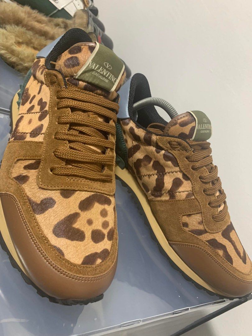 Valentino Garavani Sneakers (Category: Sneakers & Footwear) located in General Trias. Submitted by lexluxebizz (Listing ID 1414085201, Image 2). Description: VALENTINO Tricolor Leopard Print Calf Hair and Leather Rockrunner Studded Shoes MADE IN ITALY / Purchased at VALENTINO Store in Dubai Mall 100% Authentic 100% Leather PREOWNED Condition: in EXCELLENT CONDITION Material: Leather Upper / Rubber Sole Color: Tricolor (Brown/Green/Light Blue) Siz