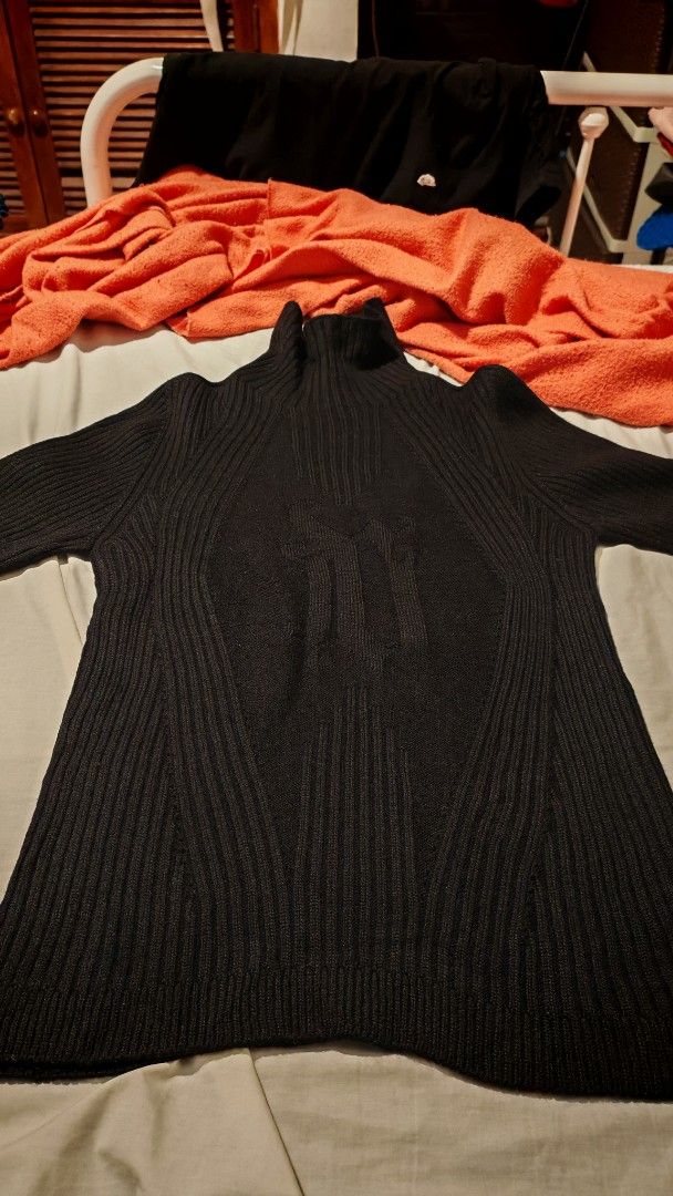 Versace M Shield Black Turtleneck Sweater 1994 fall collection (Category: Luxury Apparel) located in Baguio. Submitted by thegeuxarchive (Listing ID 1414095139, Image 1). Description: ARCHIVAL GIANNI VERSACE purchase or bidding 1. STRUCTURAL INTEGRITY • Grain Alignment: 10/10. Vertical and horizontal knit lines align perfectly when folded. Zero torque/skewing. • Seams: Insanely precise. Hand-linked construction with no loose threads or "bird-nest