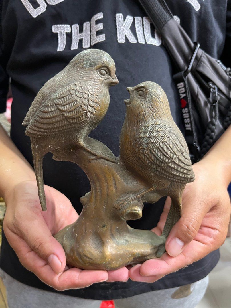 Vintage Bronze Bird Figurine (Category: Vintage Collectibles) located in Manila. Submitted by vintage_styles_co (Listing ID 1414241869, Image 3). Description: Vintage bronze figurine depicting two birds perched on a branch. It features Chinese characters at the base. A unique decorative piece for your home or a great addition to a collection..