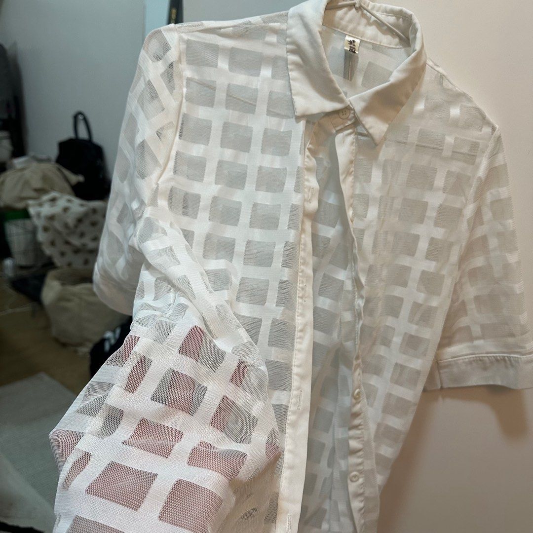 White Sheer Button-Down Polo Dress Cover-Up (Category: Dresses) located in Makati City. Submitted by marcheu (Listing ID 1414168003, Image 2). Description: - Thrifted - Great for statement piece layering - White sheer dress - Grid pattern - Collared neckline - Short sleeves - Button-down front - Lightweight, semi-transparent fabric.