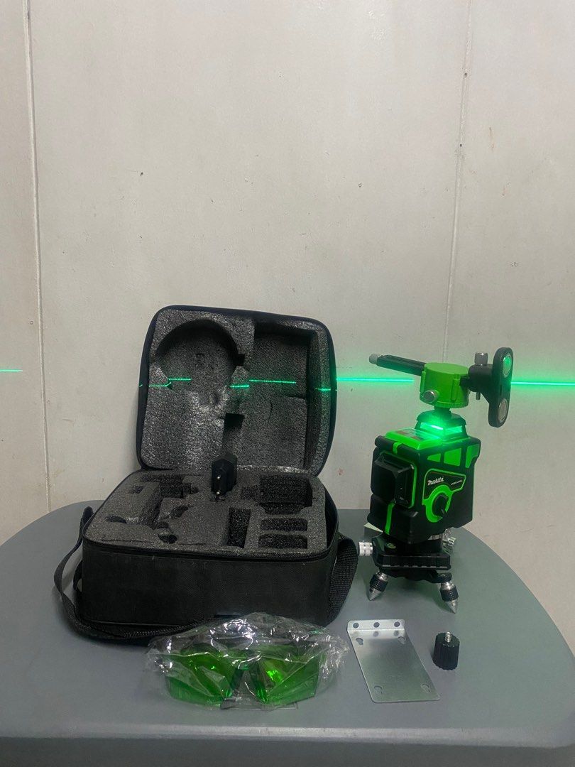 12 Line Clear Precision Laser Level High-Quality Laser Meter with Advanced Leveling Laser Technology (Category: Construction Tools & Equipment) located in Manila. Submitted by relovedmnl (Listing ID 1414262779, Image 3). Description: - Makita laser level with carrying case, green laser glasses, and accessories. - Black and green color. - In good working condition. - Includes tripod mount and other attachments. - Carrying case included for easy st