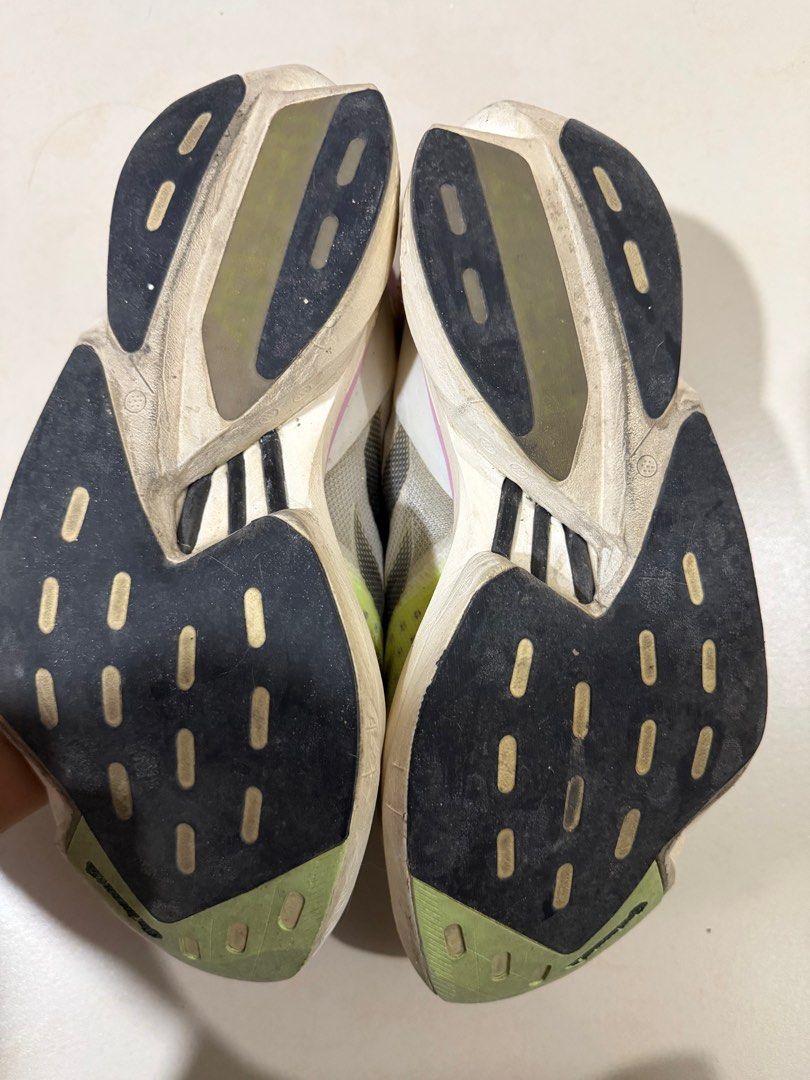 Adidas Adizero Adios Pro 3 Running Shoes (Category: Sneakers) located in Manila. Submitted by vpszb14 (Listing ID 1414311908, Image 3). Description: - Adidas Adizero Adios Pro 3 - Size: US 7.5 - Color: White, Black, Yellow - Upper: Mesh - Midsole: Lightstrike Pro - Condition: Slightly used, soles show wear.