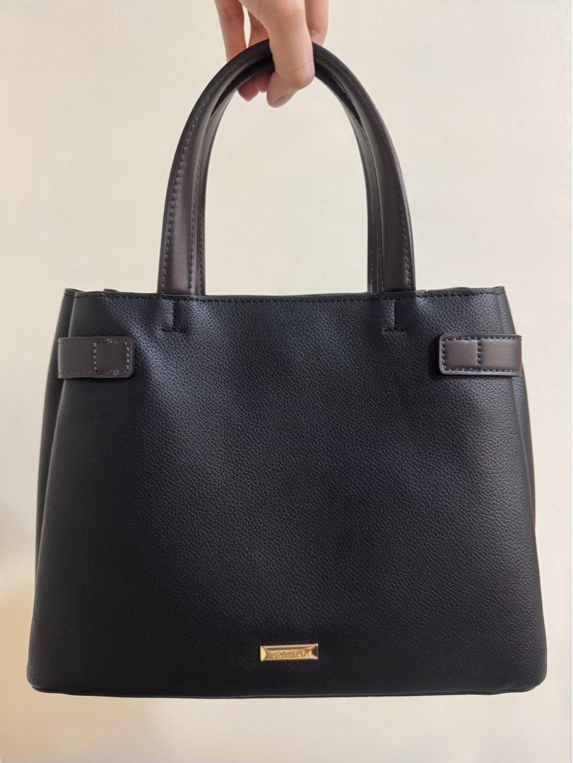 ALDO Black Top Handle Bag (Category: Shoulder Bags) located in Quezon City. Submitted by nbg.declutter (Listing ID 1414329355, Image 3). Description: - ALDO Ebaeclya Top Handle Bag - Brand new (w/o tag) - Got it on sale (P2600) - Stylish design with belt detail - Perfect for everyday use or special occasions - Shipping fee to be shouldered by the buyer - Dm for vids.
