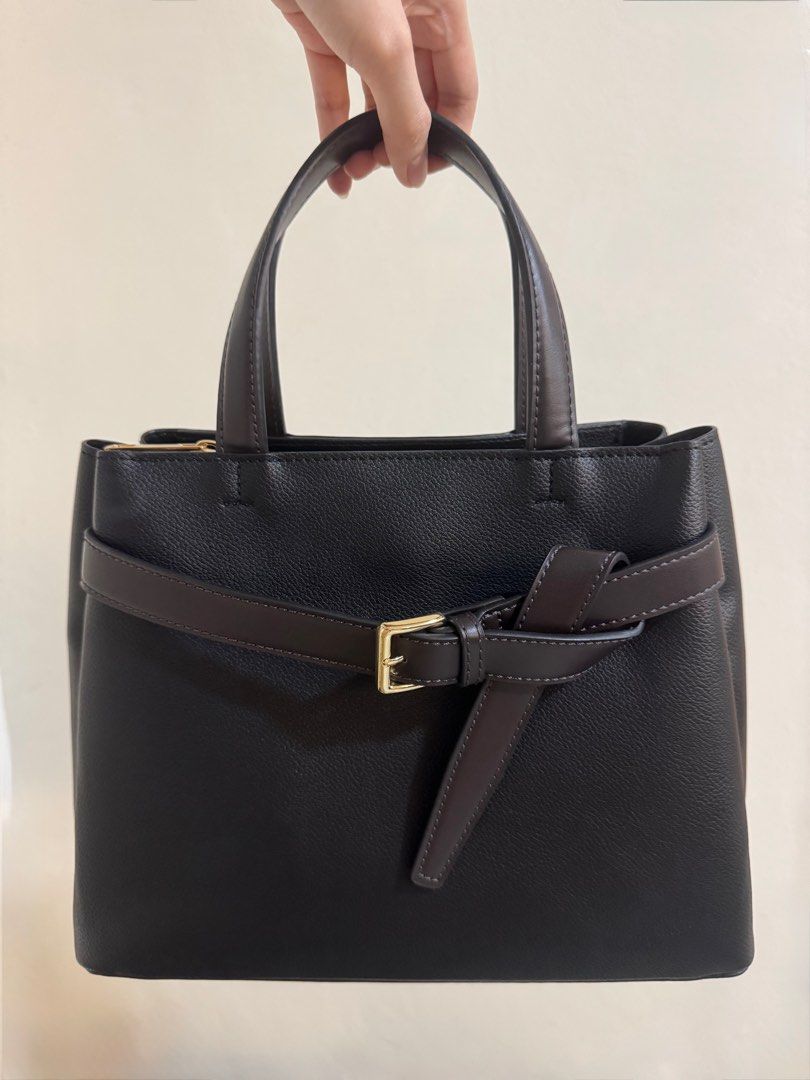 ALDO Black Top Handle Bag (Category: Shoulder Bags) located in Quezon City. Submitted by nbg.declutter (Listing ID 1414329355, Image 2). Description: - ALDO Ebaeclya Top Handle Bag - Brand new (w/o tag) - Got it on sale (P2600) - Stylish design with belt detail - Perfect for everyday use or special occasions - Shipping fee to be shouldered by the buyer - Dm for vids.