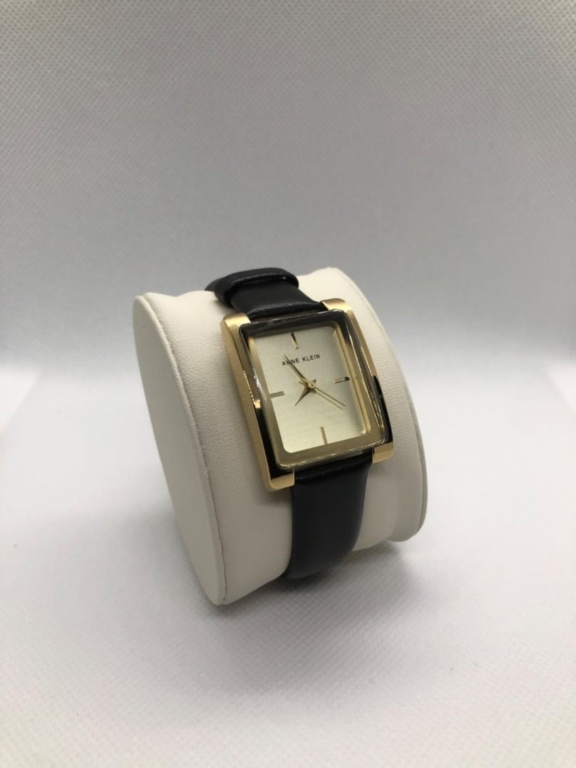 Anne Klein Gold Rectangular Watch (ARRIVING ON OR BEFORE JANUARY 21 FROM US) (Category: Women's Watches) located in Taguig. Submitted by nday26 (Listing ID 1414376606, Image 3). Description: - Anne Klein watch - Gold rectangular case - Cream-colored dial - Gold-tone hands and markers - Black leather strap - Comes with original box - Authentic Anne Klein Location: Shore 3 Tower 2, Pasay City.