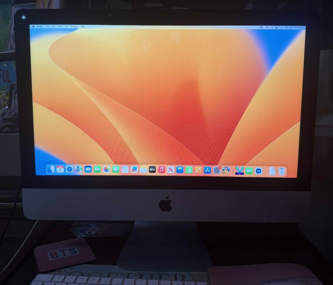Apple iMac 21.5 -inch (2020) with Accessories (Category: Desktops) located in Cavite. Submitted by kiwi870510 (Listing ID 1414321560, Image 1). Description: Apple iMac 27-inch (2020) with Retina 5K display. Includes an Apple Magic Mouse and Apple keyboard. It has an Intel Core i5 processor, 8GB RAM, and a 256GB SSD. The operating system is macOS Ventura 13.7.8. The iMac has a 27-inch display with a resolution of 5120x2880..