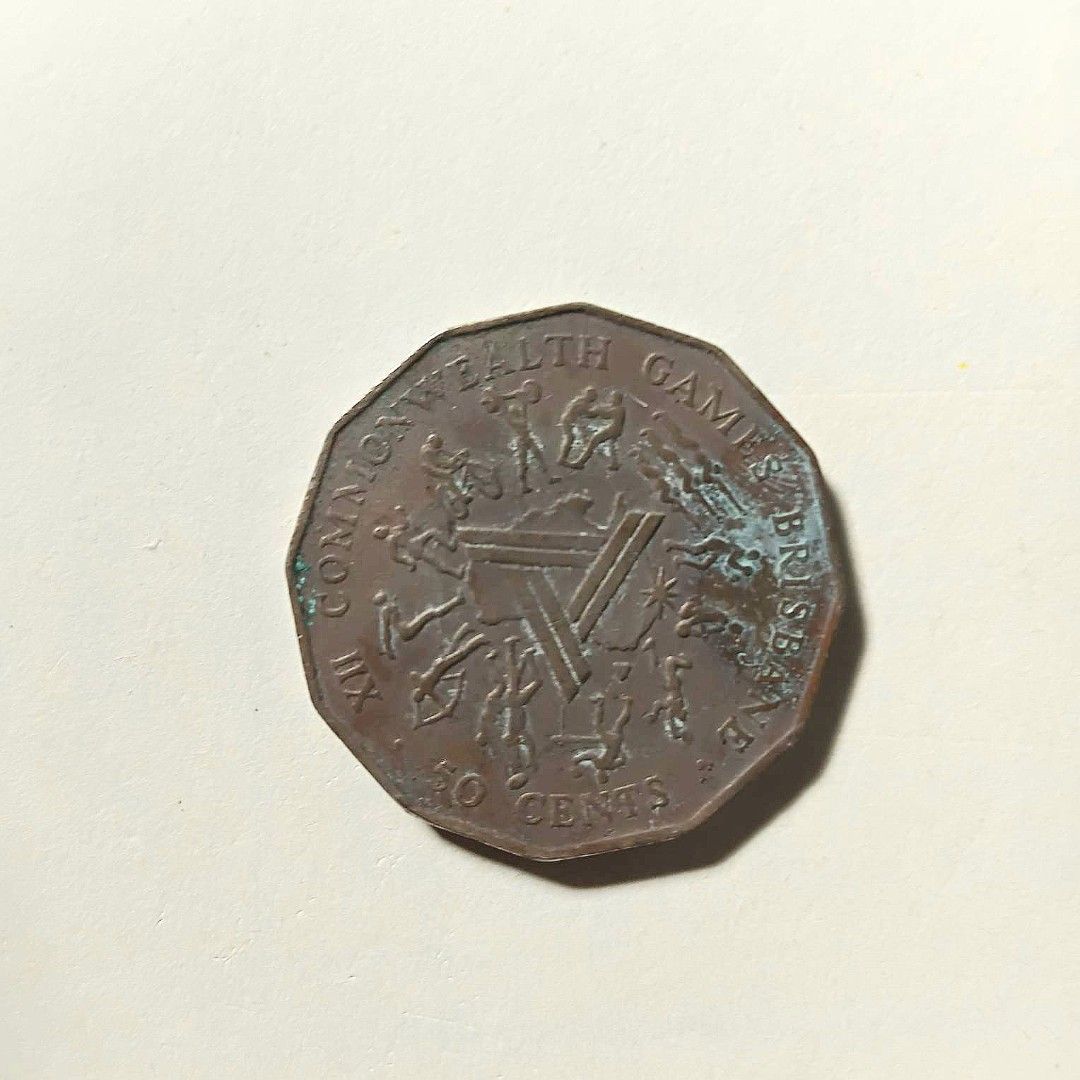 Australia 1982 50 Cents Coin (Category: Currency) located in Bacoor. Submitted by hazirannei (Listing ID 1414373537, Image 2). Description: RfS: Decluttering MoP: GCash MoD: LBC Express or Buyer's preferred Courier if thru online booking. Shipping Fee at Buyer's expense. 1982 Australian 50 Cents Coin. Features Queen Elizabeth II and the Brisbane Commonwealth Games logo. Octagonal shape, copper-nickel..
