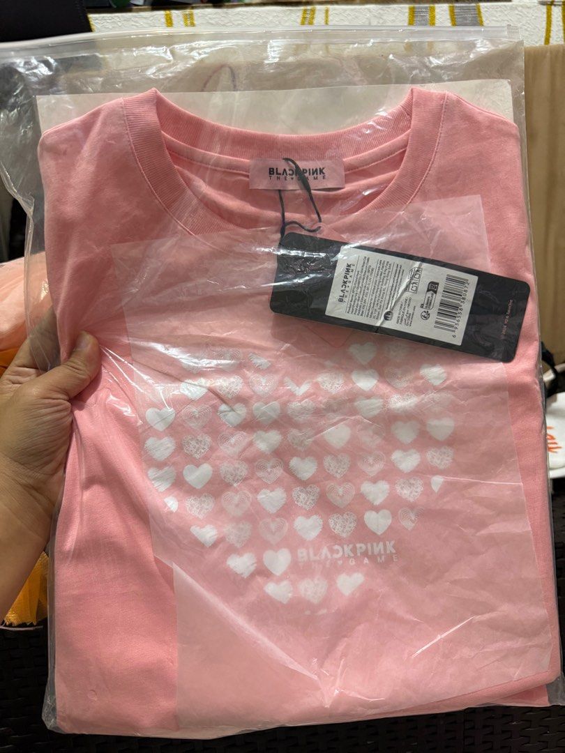 BLACKPINK THE GAME T-shirt (Category: Tshirts & Polo Shirts ) located in Manila. Submitted by ms.mr.00 (Listing ID 1414314037, Image 1). Description: - miniso Brand new BLACKPINK THE GAME T-shirt - Features a heart design on the front - Still in original packaging with tags - Crew neck style - Official merchandise from YG and Starline.