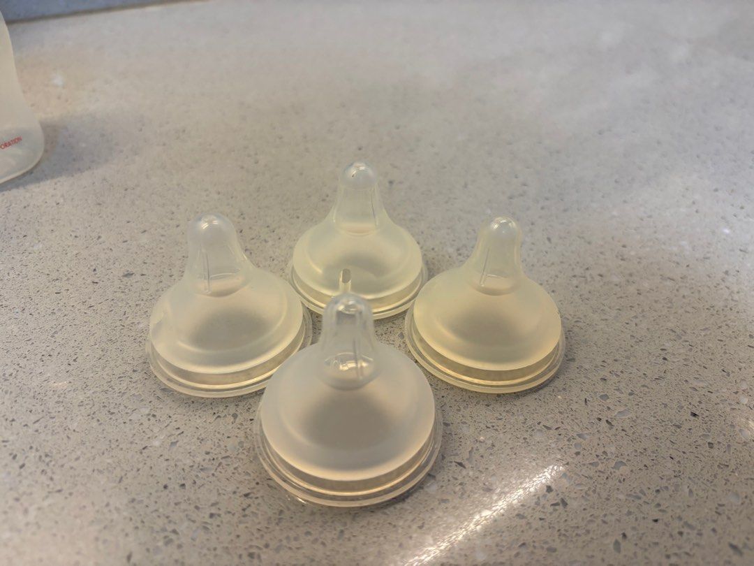 Bottle Nipples take all (Category: Breastfeeding & Bottle Feeding) located in Quezon City. Submitted by things.matter (Listing ID 1414366980, Image 2). Description: - Includes 4 clear bottle nipples - Includes 3 amber bottle nipples - Clear nipples have a different design than amber ones.