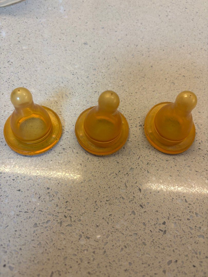 Bottle Nipples take all (Category: Breastfeeding & Bottle Feeding) located in Quezon City. Submitted by things.matter (Listing ID 1414366980, Image 3). Description: - Includes 4 clear bottle nipples - Includes 3 amber bottle nipples - Clear nipples have a different design than amber ones.