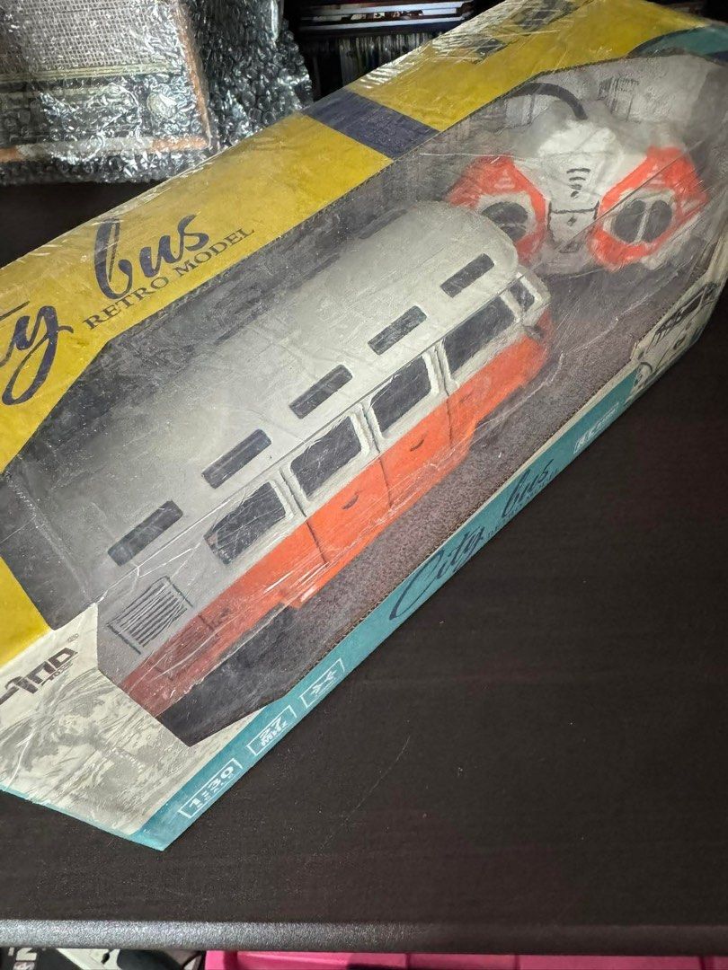 City Bus Retro Model Toy (Category: Vehicle & Diecast Models) located in Quezon City. Submitted by things.matter (Listing ID 1414272269, Image 2). Description: - City Bus Retro Model - Scale: 1:30 - Color: Orange and White - Features: Remote Control - Condition: Brand New, Sealed.