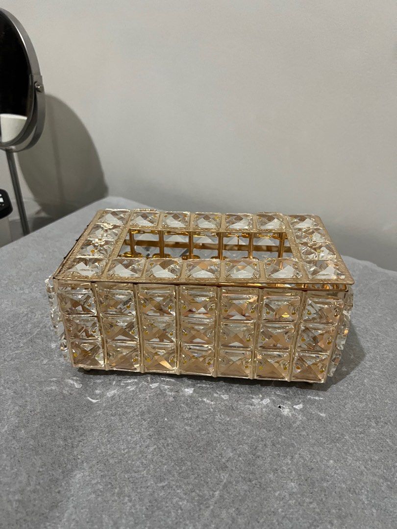Crystal Gold Tissue Box (Category: Storage Boxes & Baskets) located in Quezon City. Submitted by styleandcomfort (Listing ID 1414377623, Image 1). Description: One side a bit tilted ( i got it like that i guess due to shipping) Recently bought Message me for inquiries.