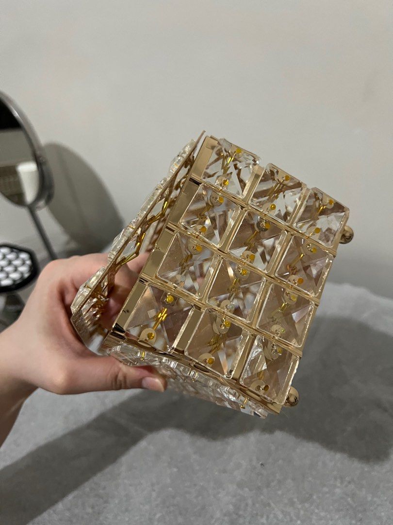 Crystal Gold Tissue Box (Category: Storage Boxes & Baskets) located in Quezon City. Submitted by styleandcomfort (Listing ID 1414377623, Image 3). Description: One side a bit tilted ( i got it like that i guess due to shipping) Recently bought Message me for inquiries.