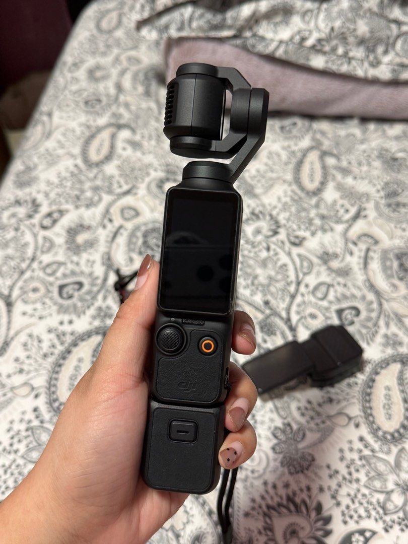 DJI Pocket 3 Camera with Accessories (Category: Cameras) located in Marikina City. Submitted by reyesjannmarielle (Listing ID 1414358618, Image 2). Description: Bought last July 2025 Used for a few times only. Comes with box, camera bag, gimbal cover, mini tripod, and wide-angle lens. .