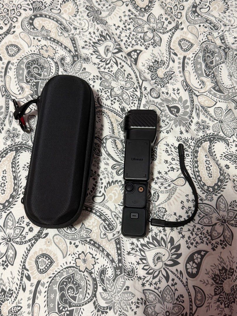DJI Pocket 3 Camera with Accessories (Category: Cameras) located in Marikina City. Submitted by reyesjannmarielle (Listing ID 1414358618, Image 1). Description: Bought last July 2025 Used for a few times only. Comes with box, camera bag, gimbal cover, mini tripod, and wide-angle lens. .