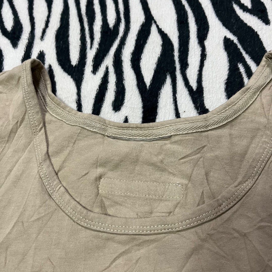 Essentials (Category: Activewear) located in Manila. Submitted by ghostofthrift24 (Listing ID 1414288021, Image 3). Description: Essentials sando No issue 23x29.