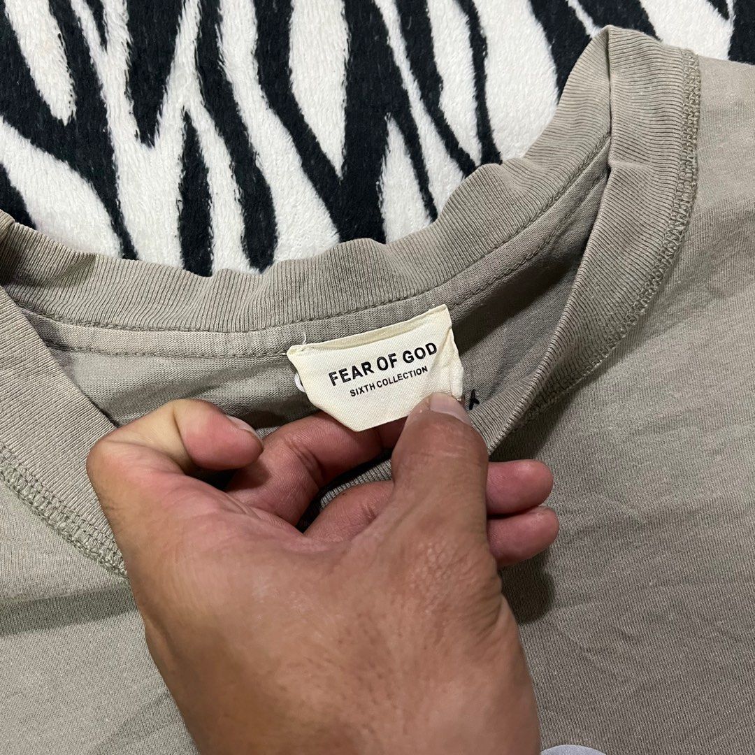 Essentials (Category: Activewear) located in Manila. Submitted by ghostofthrift24 (Listing ID 1414288507, Image 3). Description: Fear of god reflectorize FG ts No issue 24x30.5.