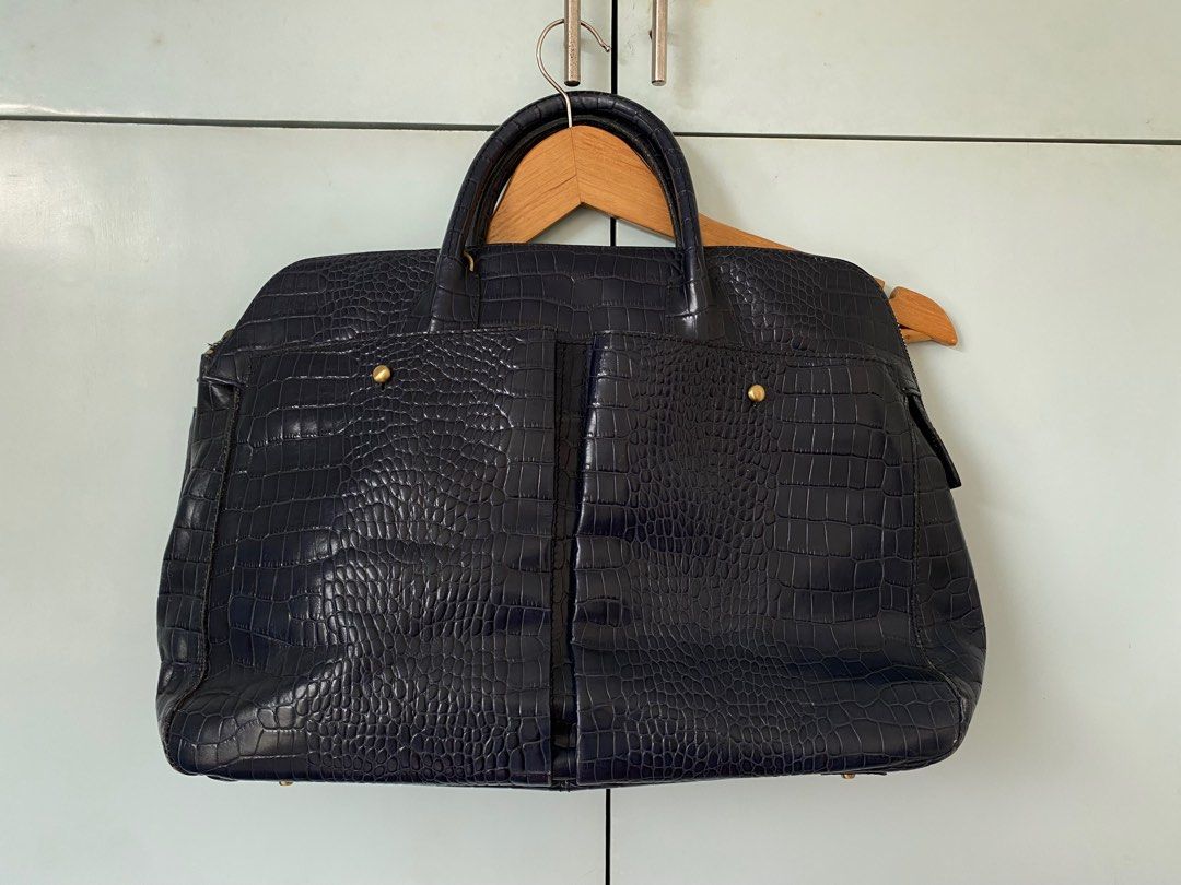 Fino Blue Croc Leather Handbag (Category: Tote Bags) located in Marikina City. Submitted by _chiaseeds (Listing ID 1414331955, Image 1). Description: - Dark blue - Dual top handles - Zip closure - Includes a detachable shoulder strap - Rfs: decluttering.