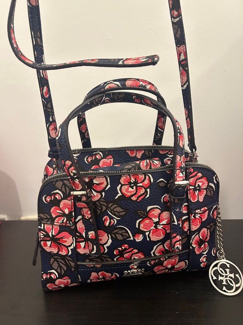 GUESS floral handbag authentic with detachable strap (Category: Shoulder Bags) located in Dasmarinas. Submitted by _beautifulthings_ (Listing ID 1414279987, Image 1). Description: 🌸 authentic 🌸 well-used 💐 needs cleaning 🌸 with detachable strap 🌸 many compartments.