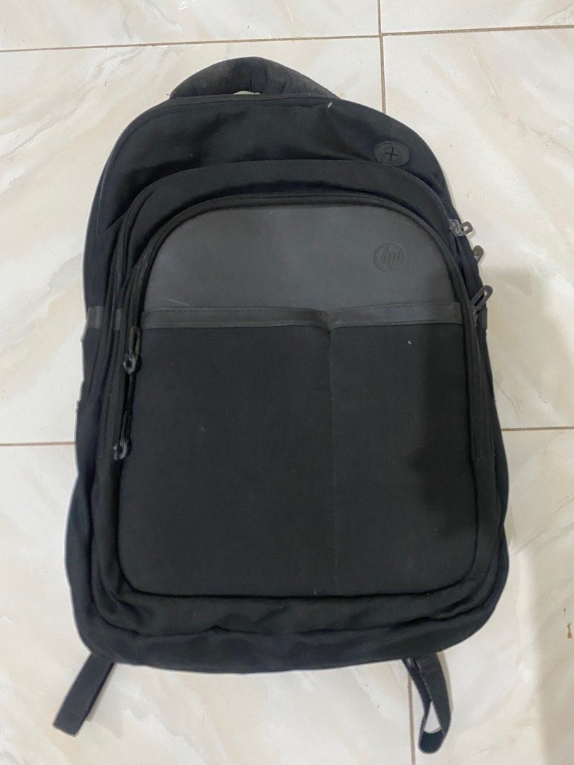 HP Black Backpack (Category: Backpacks) located in Manila. Submitted by tworkz0804 (Listing ID 1414377298, Image 1). Description: - Black HP backpack - Multiple compartments and zippers - Padded back and shoulder straps for comfort - Top handle for easy carrying - Sleek design - Durable material.