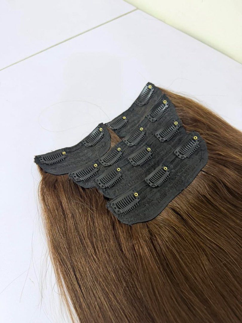 Human hair extension (Brown) (Category: Hair Accessories) located in Pasig City. Submitted by x.declutter (Listing ID 1414424237, Image 2). Description: - Warm brown clip-in hair extensions - Multiple clips for secure attachment - Long and straight for a natural look - Easy to apply and style - Adds instant volume and length - Perfect for highlights or a complete hair transformation -20inches -worn once -original price: 8k -I got it from mermaid 