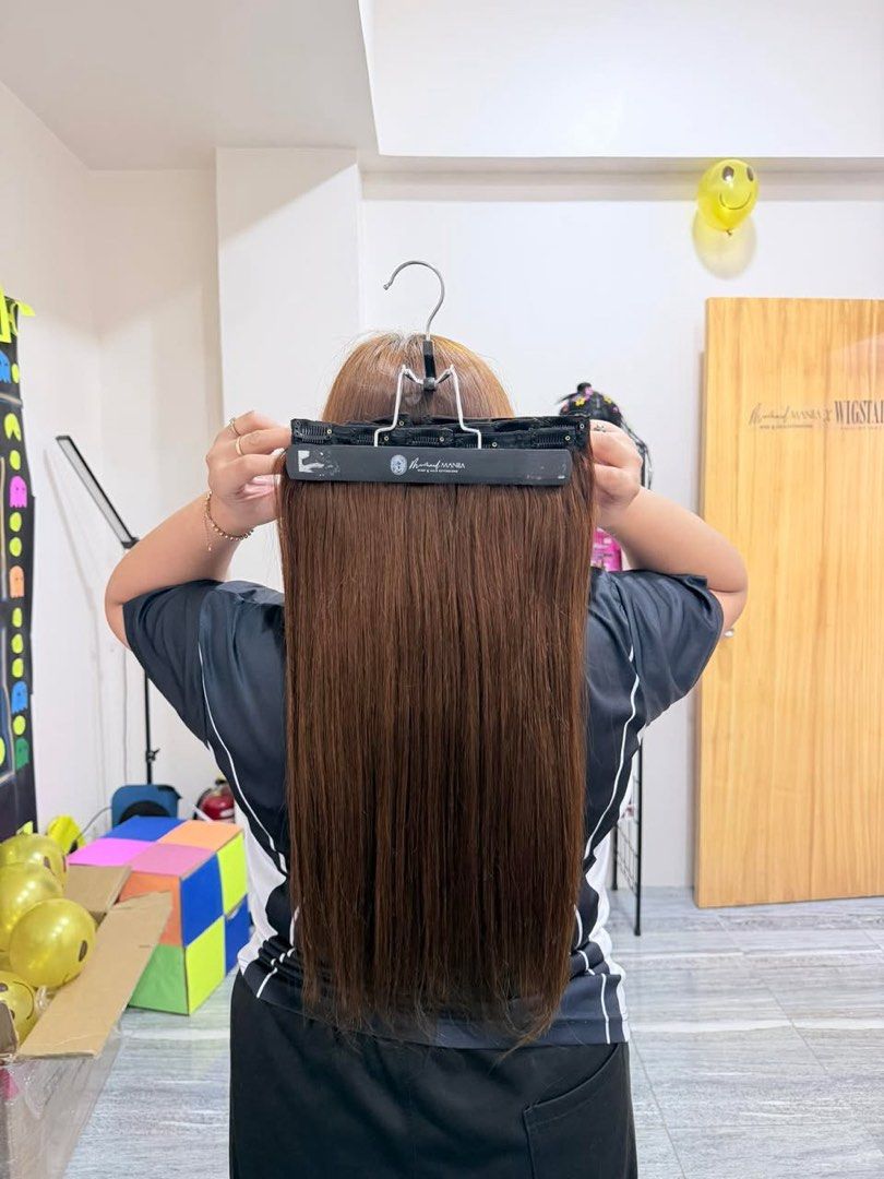 Human hair extension (Brown) (Category: Hair Accessories) located in Pasig City. Submitted by x.declutter (Listing ID 1414424237, Image 3). Description: - Warm brown clip-in hair extensions - Multiple clips for secure attachment - Long and straight for a natural look - Easy to apply and style - Adds instant volume and length - Perfect for highlights or a complete hair transformation -20inches -worn once -original price: 8k -I got it from mermaid 