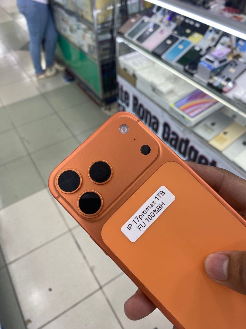 iPhone 17 Pro Max 1TB 100% BATT SLIGHTLY USE NTC OPENLINE (Category: iPhone 17 Series) located in Manila. Submitted by benshop. (Listing ID 1414332994, Image 2). Description: FOR SALE | TRADE/SWAP BenShop Price :98,490 php ▫️On hand: iPhone 17 Pro Max ▫️1TB ▫️Openline/Factory unlocked ▫️Orange ▫️100% Batt health ▫️Ntc Local Variant INCLUSIONS & FREEBIES: *CHARGER SET *CLEAR CASE *TEMPERED GLASS MODE OF TRANSACTION: ▫️ STORE PICK UP (Preferred) ▫️