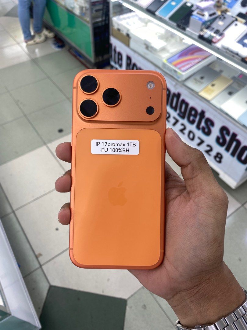 iPhone 17 Pro Max 1TB 100% BATT SLIGHTLY USE NTC OPENLINE (Category: iPhone 17 Series) located in Manila. Submitted by benshop. (Listing ID 1414332994, Image 1). Description: FOR SALE | TRADE/SWAP BenShop Price :98,490 php ▫️On hand: iPhone 17 Pro Max ▫️1TB ▫️Openline/Factory unlocked ▫️Orange ▫️100% Batt health ▫️Ntc Local Variant INCLUSIONS & FREEBIES: *CHARGER SET *CLEAR CASE *TEMPERED GLASS MODE OF TRANSACTION: ▫️ STORE PICK UP (Preferred) ▫️