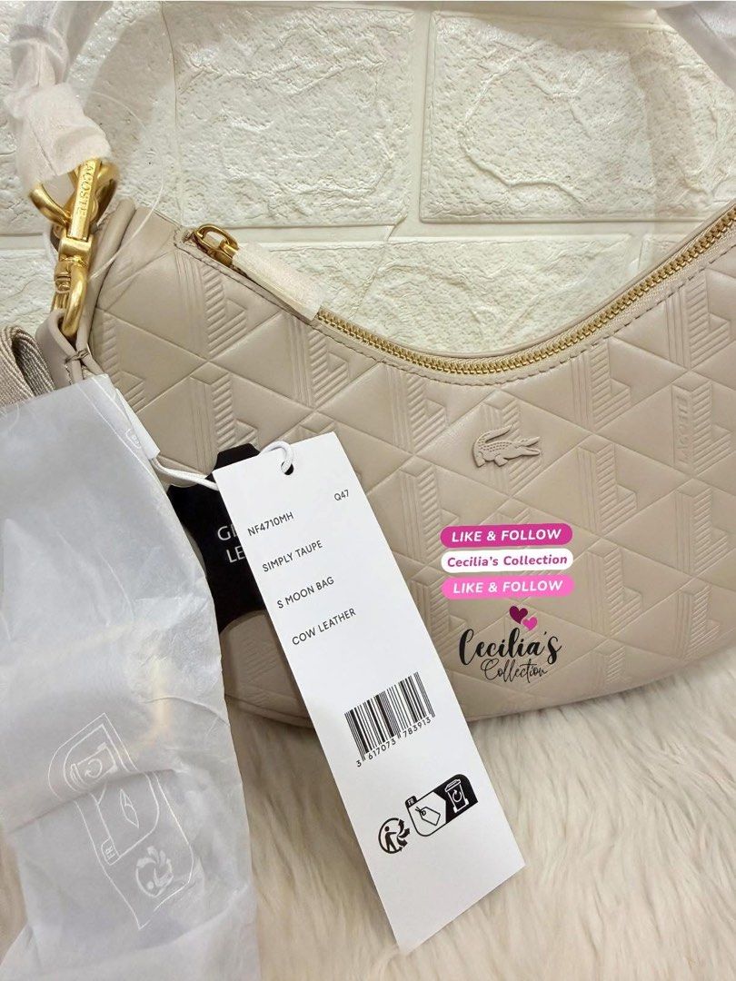 Lacoste Maheki Embossed Leather Half Moon Purse (Category: Shoulder Bags) located in Paranaque City. Submitted by ceciliascollection (Listing ID 1414255690, Image 3). Description: Lacoste Maheki Embossed Leather Half Moon Purse ❣️ON HAND & READY TO SHIP 💯Authentic from Lacoste Singapore 💰Mall Price ₱12,950.00 ✔️color: Simply Taupe ✔️brand new with tag ✔️with dust bag ✔️with paper bag Description: This elegant Maheki leather half-moon bag featur