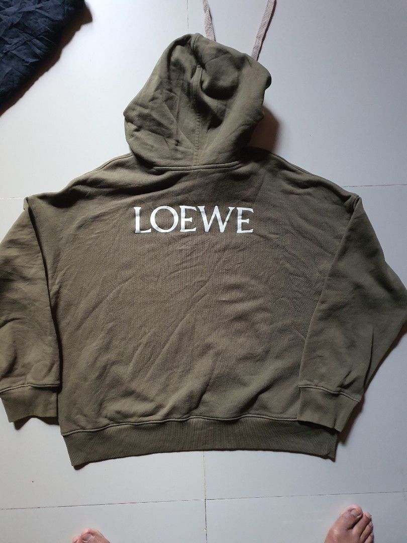 Loewe Hoodie Olive Green (Category: Coats, Jackets and Outerwear) located in Manila. Submitted by jmm9557160465 (Listing ID 1414429747, Image 3). Description: Loewe hoodie women's jacket size small excellent condition issue cut tag .