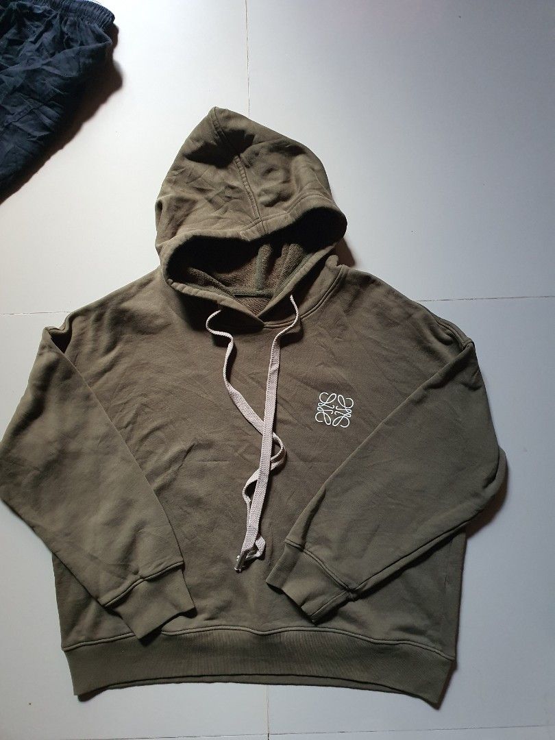 Loewe Hoodie Olive Green (Category: Coats, Jackets and Outerwear) located in Manila. Submitted by jmm9557160465 (Listing ID 1414429747, Image 1). Description: Loewe hoodie women's jacket size small excellent condition issue cut tag .