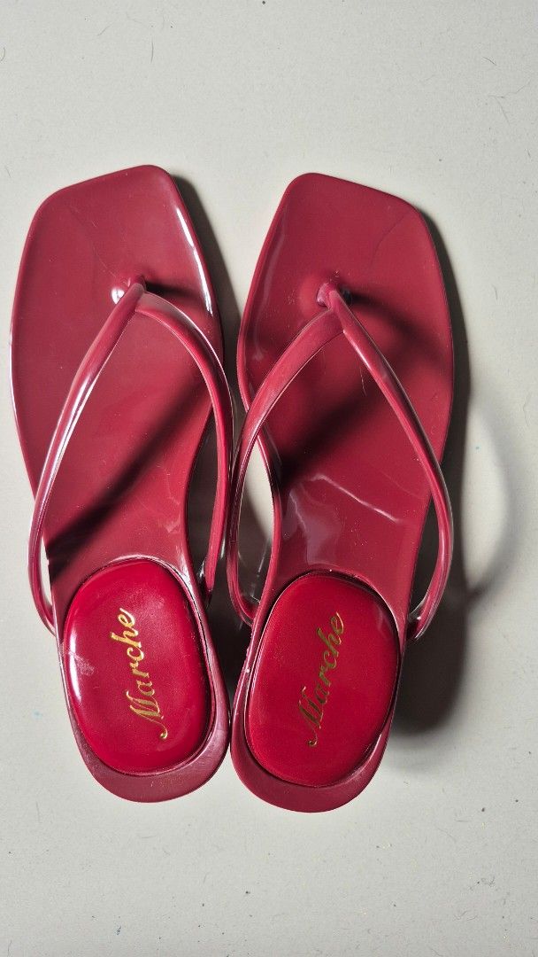 Marche Red Heeled Sandals (Category: Heels) located in Caloocan City. Submitted by danahsaur (Listing ID 1414308818, Image 1). Description: - Red Marche sandals - Square toe design - Small heel - Thong strap - Textured soles for grip - Marche branding on insole -made of plastic material.