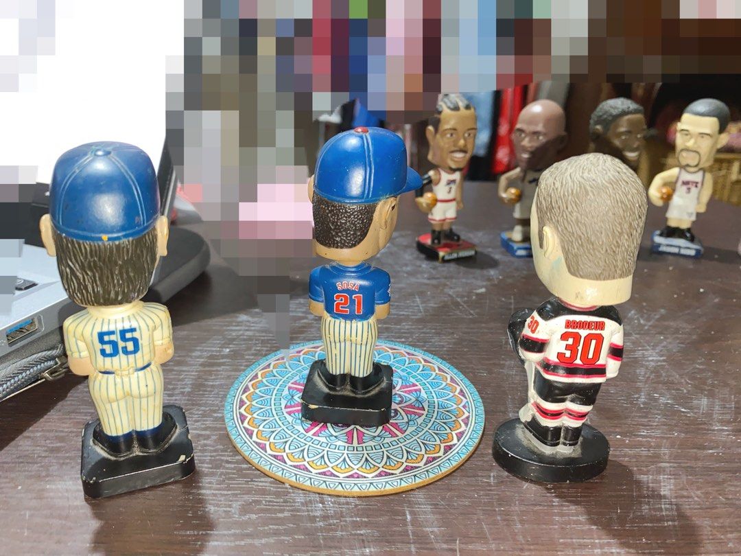 Take all NBA & MLB BOBBLEHEAD COLLECTIBLES (Category: Figurines & Statues) located in Manila. Submitted by janine_moon (Listing ID 1414291424, Image 3). Description: Pre-owned NBA and MLB bobblehead figures featuring classic sports legends. Great for collectors, display, or gifts. Condition (PLEASE READ): • Minor paint wear and surface scratches • Some discoloration due to age • Bobble movement may vary • Dust from storage/display • No boxes incl