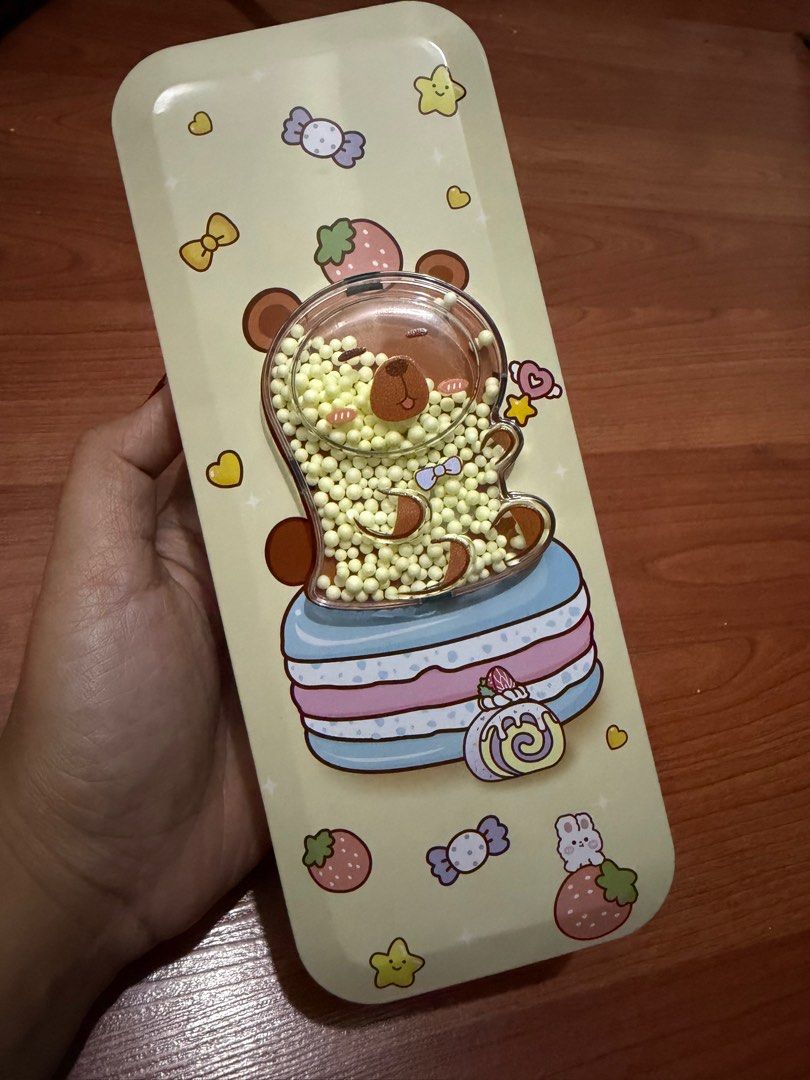 Pencil Case Tin Cute Capybara with partition imported (Category: Stationery & School Supplies) located in Pasig City. Submitted by etcyshop (Listing ID 1414426763, Image 1). Description: Metal Pencil Case Essentials Material: Metal/ Tin High quality Size: L x H x D (in cm) 22.5 x 4 x 9.25 Pwede rin for organizing, toiletry kit, travel pouch.