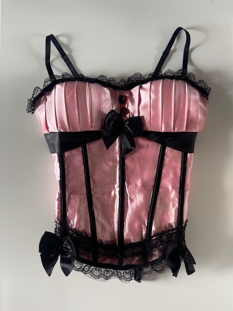 Pink Satin Corset with Black Bows (Category: Others Tops) located in Cavite. Submitted by devilourea (Listing ID 1414306325, Image 1). Description: - Pink satin corset - Black ribbon detailing and bows - Adjustable straps .