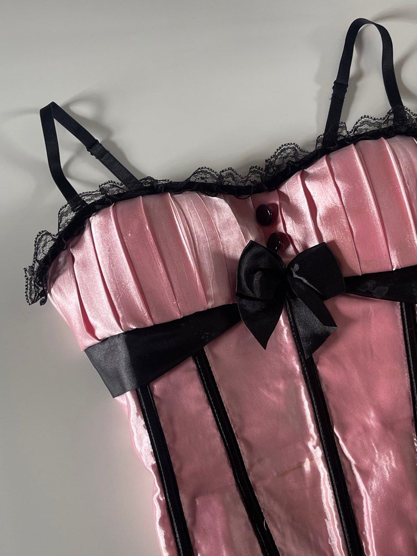 Pink Satin Corset with Black Bows (Category: Others Tops) located in Cavite. Submitted by devilourea (Listing ID 1414306325, Image 2). Description: - Pink satin corset - Black ribbon detailing and bows - Adjustable straps .