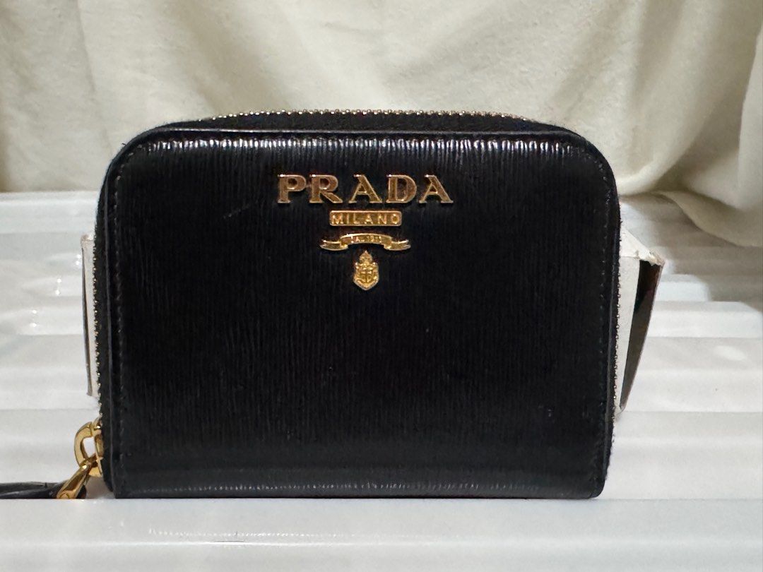 Prada Nero Vitello Move I Wallet (Category: Luxury Bags & Wallets) located in Manila. Submitted by chami1104 (Listing ID 1414371411, Image 1). Description: - Authentic Prada wallet - Color: Black (Nero) - Zip-around closure - Multiple interior compartments - Includes original box and authenticity card - Made in Turkey - Model number: 1MM268.