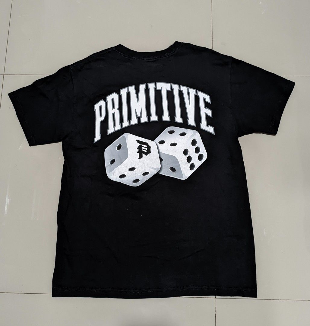 Primitive Dice Graphic Tee (Category: Tshirts & Polo Shirts ) located in Caloocan City. Submitted by wupeeram (Listing ID 1414397051, Image 1). Description: - Black Primitive t-shirt - Features a dice graphic on the back - Brand logo on the front - Crew neck and short sleeves - Measurements: L28, W20.5.
