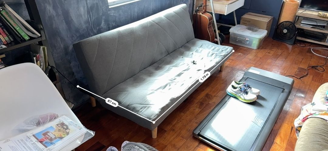 Sofa Bed (Category: Sofas) located in Pasig City. Submitted by doodale (Listing ID 1414315773, Image 2). Description: Selling our old sofa bed it still works well as both a sofa and a bed. Details: Approx. size: 178 cm (L) x 87 cm (W) Neutral gray fabric – easy to match with most interiors Converts easily from sofa to bed Stable legs and solid frame Condition notes (please read): Fabric has visible wear and tear, including small holes and scratch