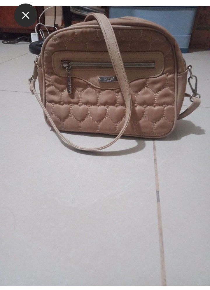 TAKE ALL!!! (Category: Cross-body Bags) located in Manila. Submitted by chedelm (Listing ID 1414379584, Image 1). Description: crossbody body bag and straightening comb get nyo po pm lang take the 2 items for 500 only.