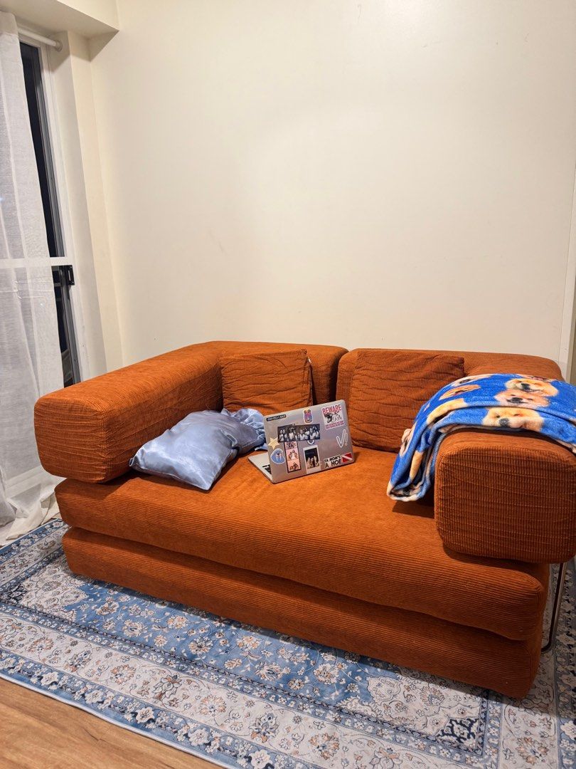 Teddy Sofa (Category: Sofas) located in Makati City. Submitted by ericaranjo (Listing ID 1414397944, Image 1). Description: - Orange corduroy sofa - Modular design - Wide seating area with armrests - Includes two back cushions - Ideal for small spaces - Perfect for lounging and relaxing Bought for 22k — 5 months old .